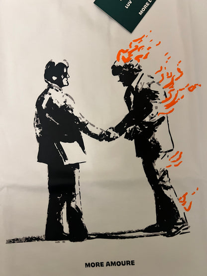 Artistic depiction of a person on fire with flames, on a white background with 'More Amour' branding.