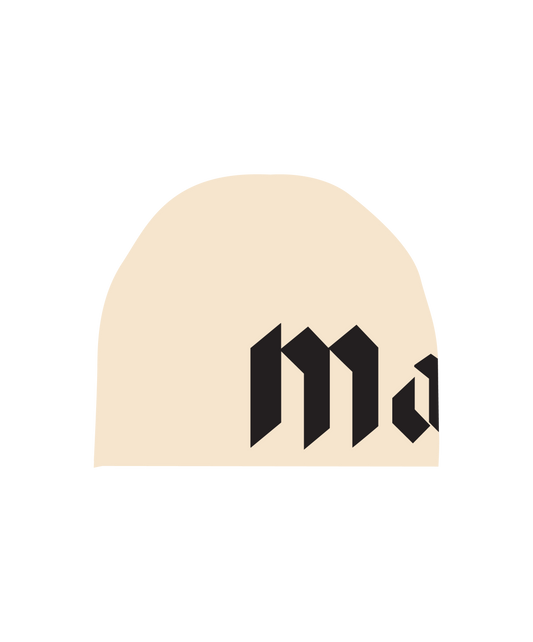 The front of the more amoure cotton skullcap in cream and black